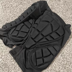 Mottog snowboard-impact vadderade shorts och knäskydd från kund B****t